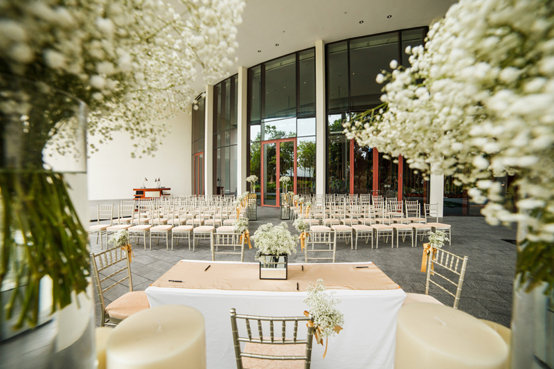 Wedding banquet hall setup in Singapore where guests present ang bao to newlyweds